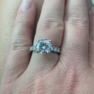 3.5 carat moissinite with .1 carat side stones set in sterling silver